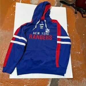 XL Official NHL New York Rangers Blue and Red Hoodie with a rip in pocket